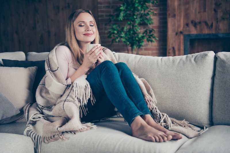 warm furnace and happy woman