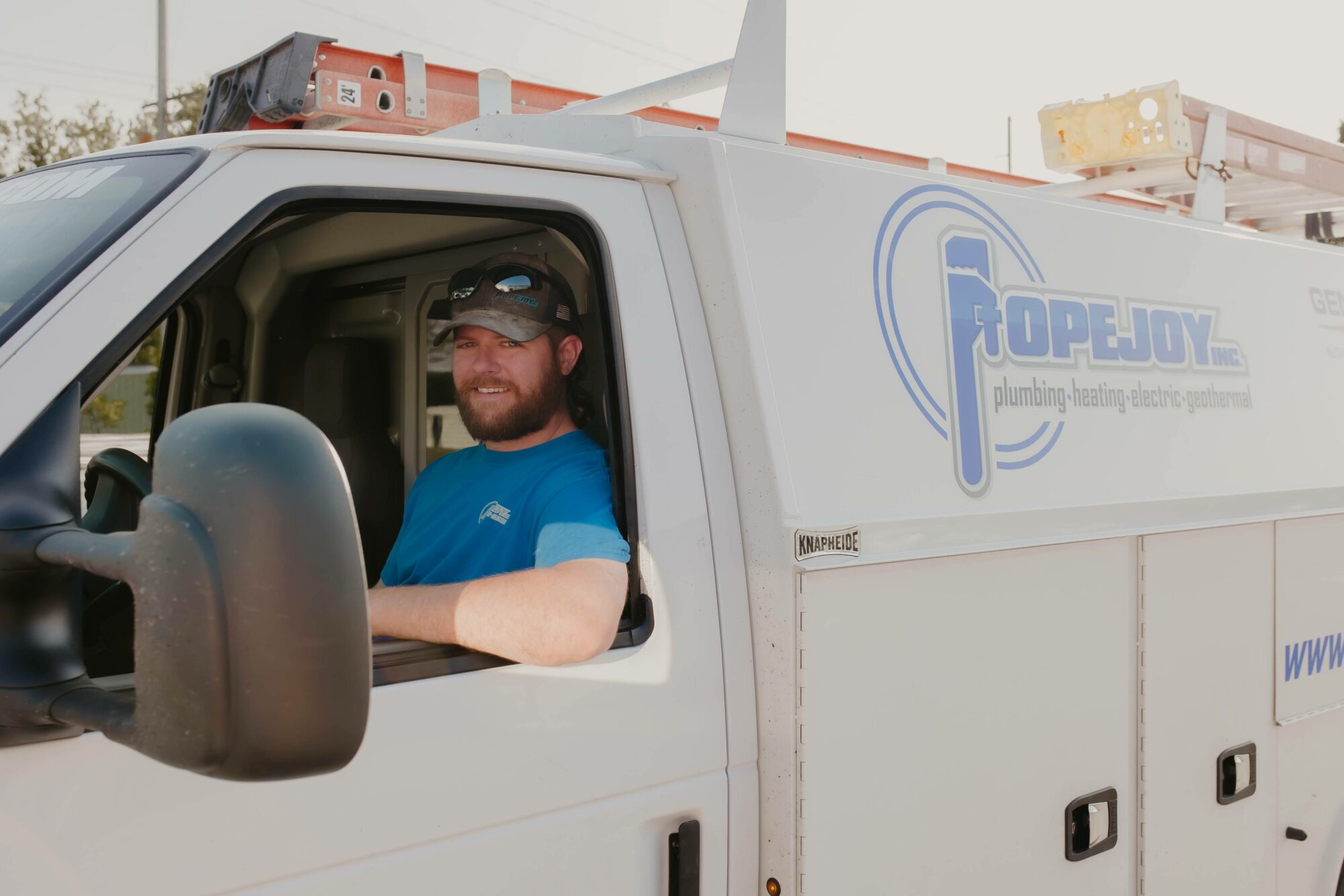 Popejoy employee in Popejoy vehicle